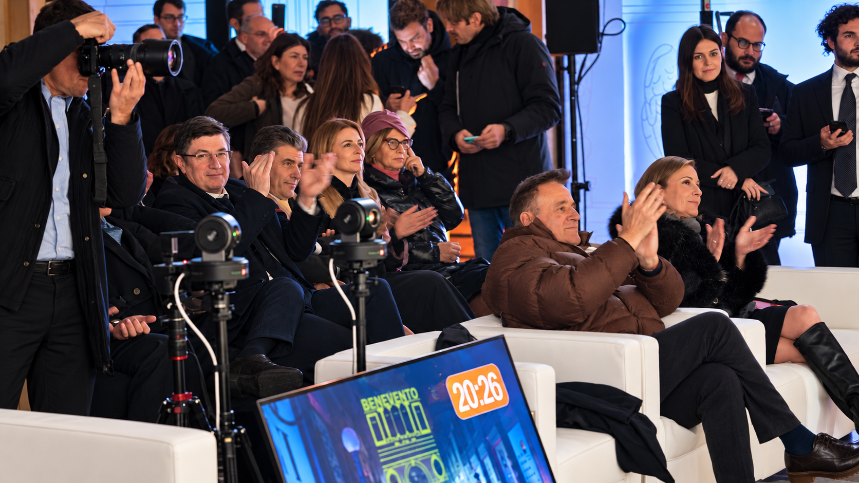 Camera operator among the audience